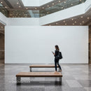 Modern art gallery interior with walking woman