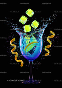 Refreshing lime cocktail with ice cubes splash
