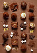 Assorted gourmet chocolate truffles with golden decoration