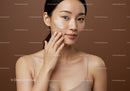 Young Woman Applying Face Cream for Skincare Routine
