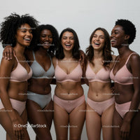 Diverse group of women smiling in lingerie together