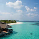 Tropical Paradise with Overwater Bungalows and Clear Turquoise Water