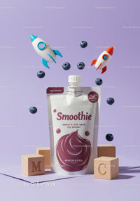 Blueberry smoothie pouch with playful rocket toys and blocks