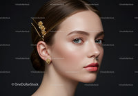 Elegant Woman with Gold Jewelry and Floral Hair Accessory Fashion Portrait