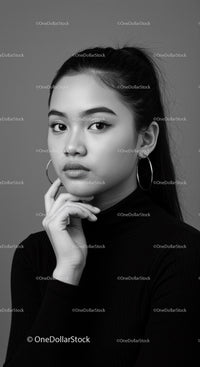 Elegant Black and White Portrait of a Confident Woman with Hoop Earrings