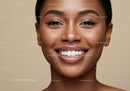 Close up portrait of smiling young woman with clear skin