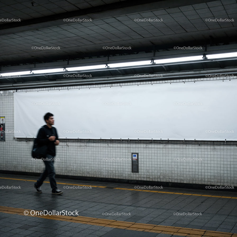 Minimalist Subway Tunnel with Tiled Walls and Modern Lighting