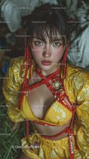 Vibrant Young Woman in Yellow Kimono with Red Braids Outdoors