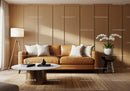 Cozy modern living room with leather sofa and orchids