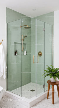 Modern glass shower with green subway tile walls
