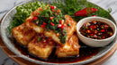 Crispy Fish Fillets with Spicy Soy Sauce Garnished with Spring Onion