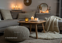 Cozy living room with candles and knitted decor