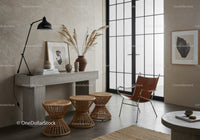 Modern cozy living room with rattan stools and leather chair