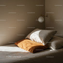 Cozy Bedroom with Soft Pillows and Warm Lighting