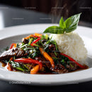Colorful Stir-Fried Beef with Peppers and White Rice on Plate