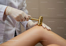 Gold Massage Hammer Practitioner Performing Skin Therapy