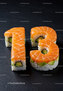 Fresh sushi rolls shaped as number thirteen on black slate