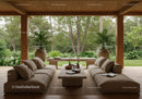 Cozy open living room with garden view and natural decor