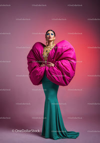 Fashion Model in Vibrant Pink and Yellow Flowing Gown