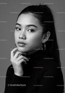 Elegant Black and White Portrait of an Asian Woman with Stylish Hair