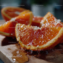 Close-Up of Juicy Blood Orange Slices on Wooden Cutting Board