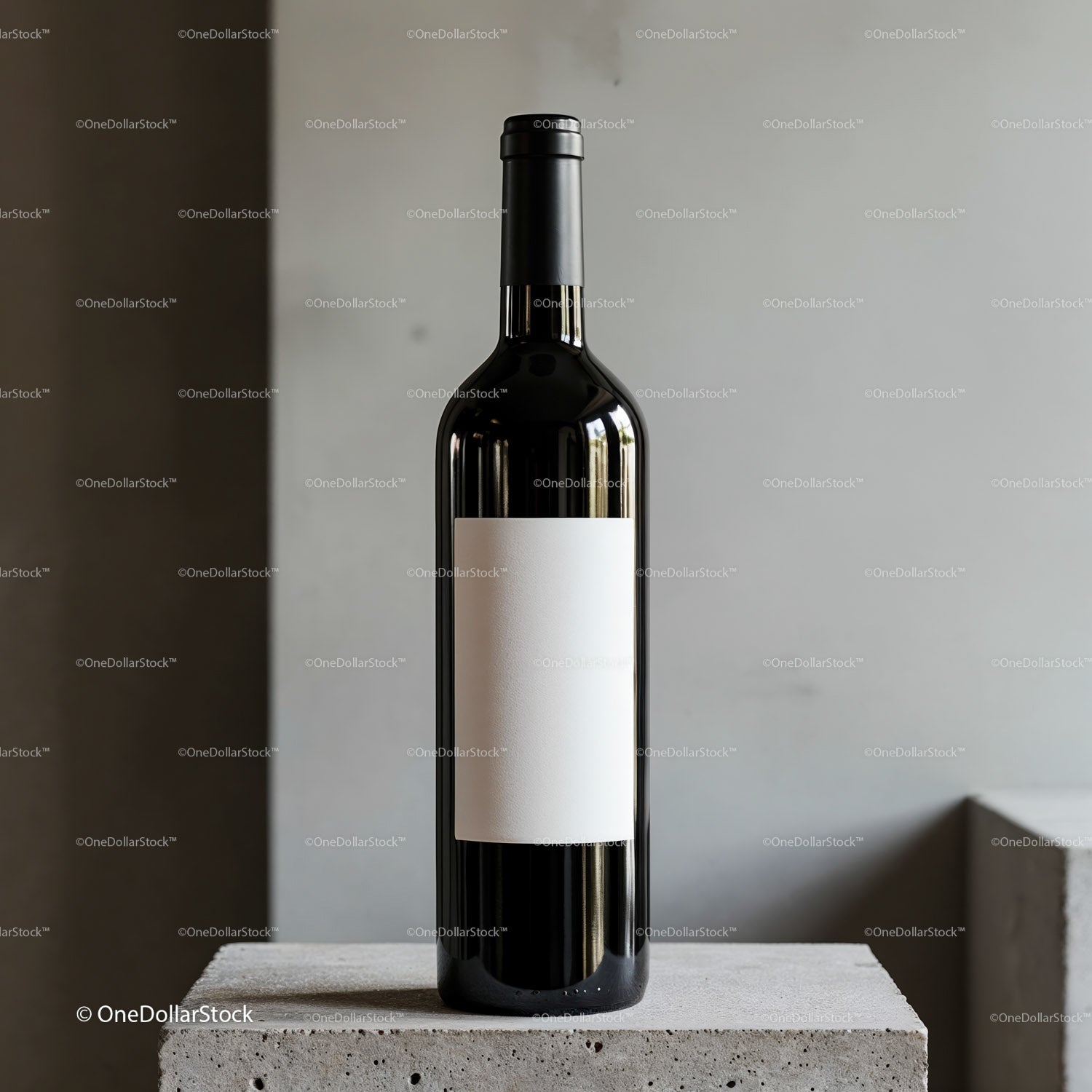 Elegant wine bottle with blank label on concrete surface