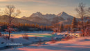 Snowy mountain landscape bathed in warm sunset light