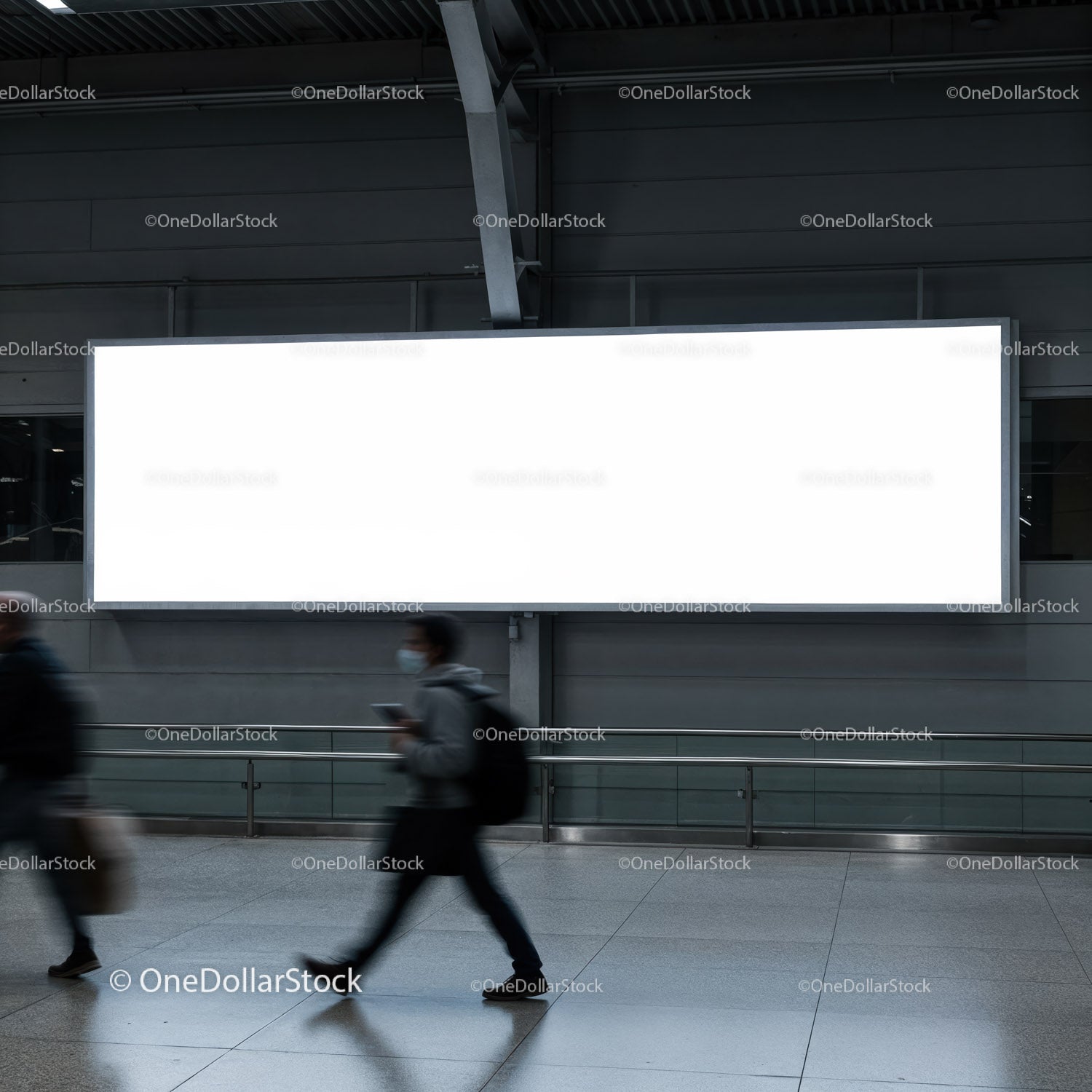 People walking past a large blank city billboard