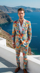 Man in Vibrant Floral Suit Standing by Coastal Cliffside