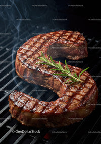 Grilled Steak Shaped Like Letter S with Fresh Rosemary