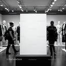 Blank White Canvas in Modern Fashion Store Interior
