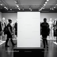 Blank White Canvas in Modern Fashion Store Interior