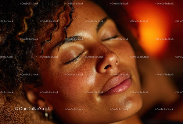 Close-up of a Relaxed Woman with Glowing Skin and Freckles