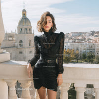 Elegant Black Dress Model with Cityscape Background