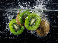 Vivid Green Kiwi Slices Splashing into Water