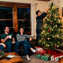 Friends Enjoy Decorating Christmas Tree at Home