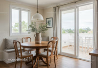 Cozy dining nook with wooden table and natural light