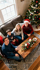 Happy family gathered around cozy Christmas living room