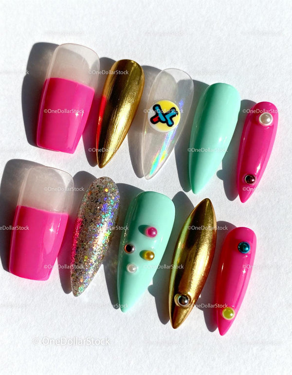 Colorful elegant false nails with gems and glitter
