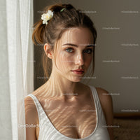 Young Woman with Blue Eyes and Sunlight Shadows in Casual Indoor Setting