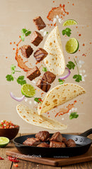 Spiced beef chunks with tortillas and fresh lime slices