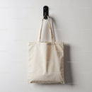 Minimalist Canvas Tote Bag Hanging on Wall Hook