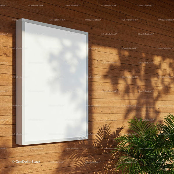 Blank vertical poster on wooden wall with plant shadows JPG Mockup Image