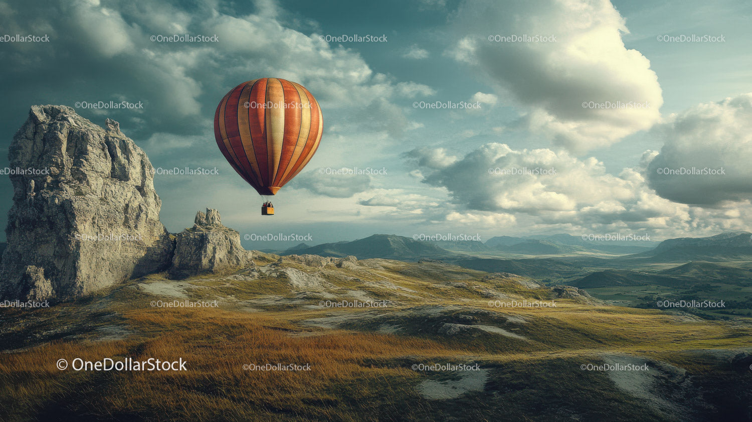Colorful Hot Air Balloon Floating Over Rocky Mountain Landscape