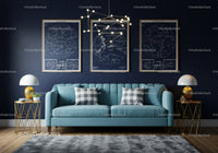 Modern living room with blue sofa and star maps
