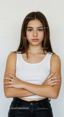 Teen Girl with Confident Expression in White Tank Top