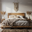 Cozy neutral bedroom with wooden bed and decor