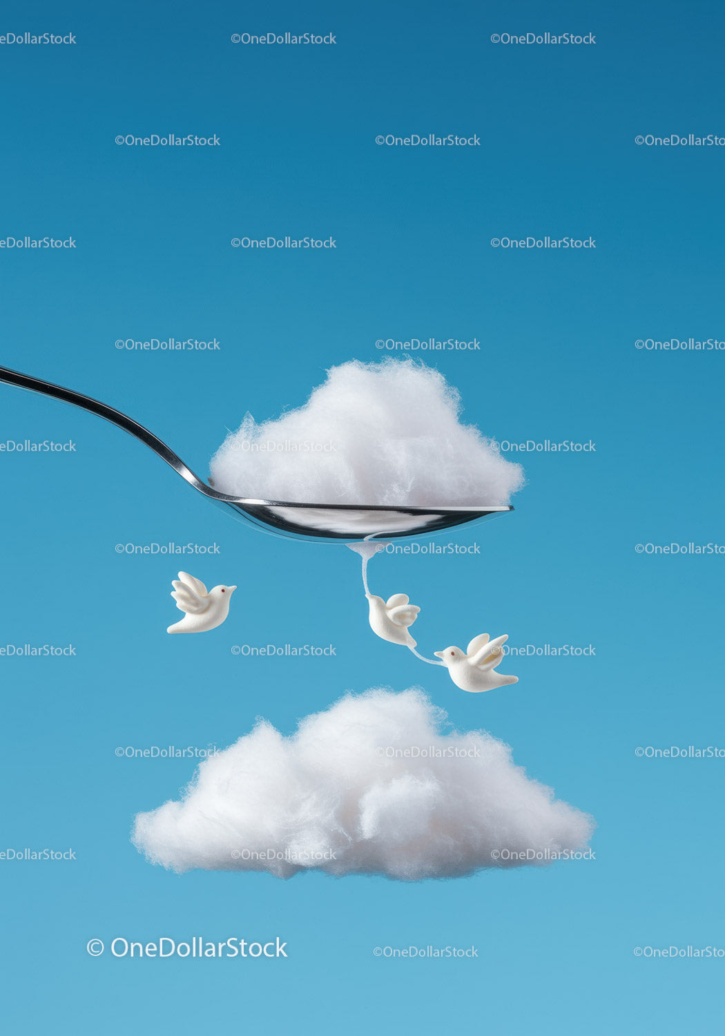 Spoon with fluffy cloud and flying bird figurines