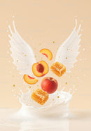 Peach and honeycomb with wings splashing in milk