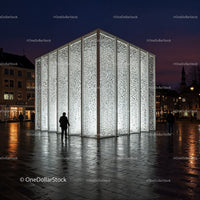 Modern Light Art Sculpture in Urban Night Skyline